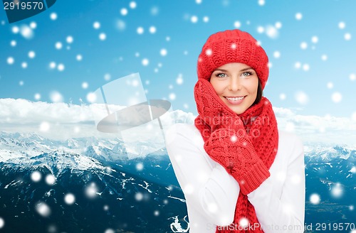 Image of smiling young woman in winter clothes