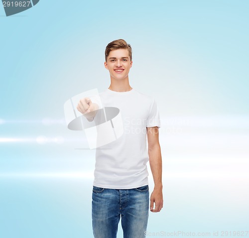 Image of smiling young man in blank white t-shirt