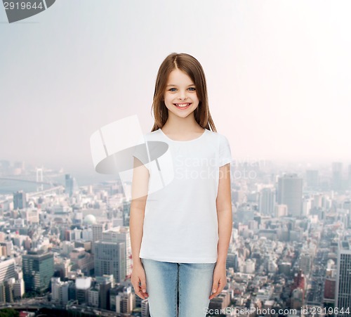 Image of smiling little girl in white blank t-shirt