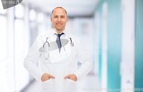 Image of smiling male doctor in white coat with stethoscope