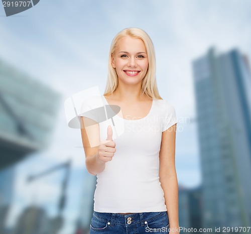 Image of woman showing thumbs up