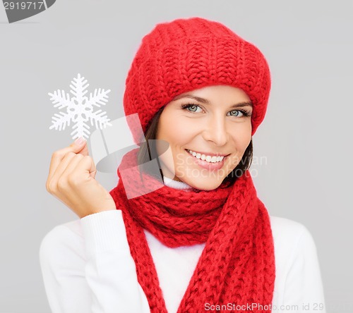 Image of smiling young woman in winter clothes