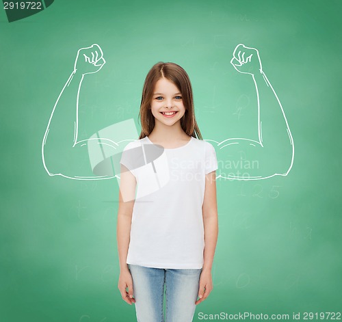 Image of smiling little girl in white blank t-shirt