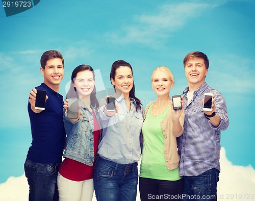 Image of students showing blank smartphones screens