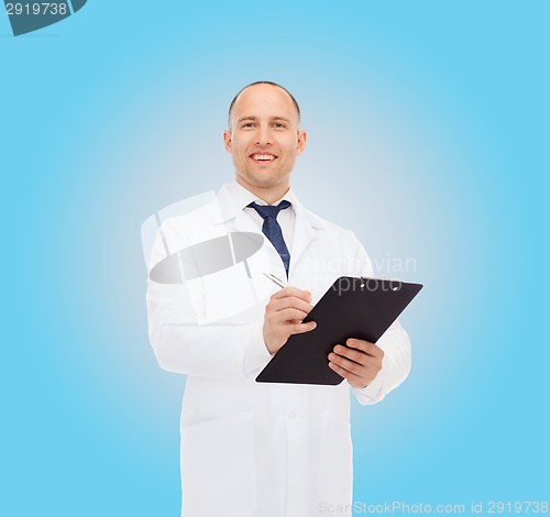 Image of smiling male doctor with clipboard