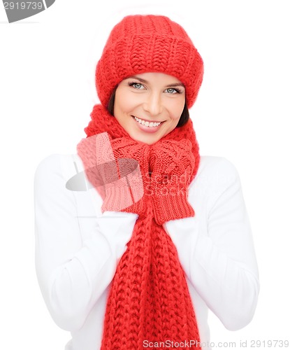 Image of smiling young woman in winter clothes