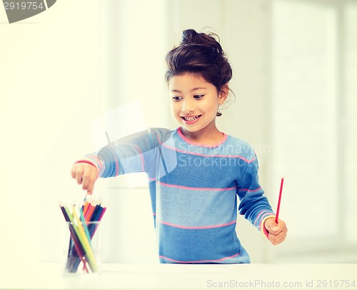 Image of little girl drawing