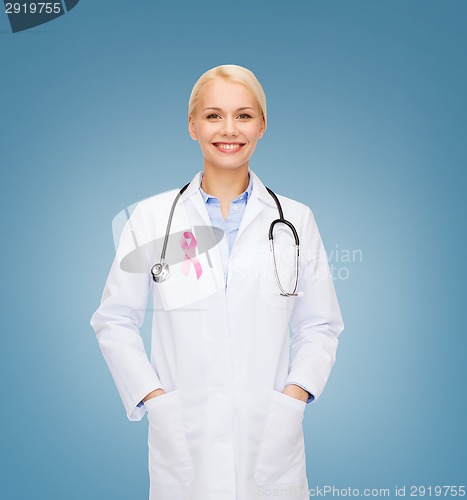Image of doctor with stethoscope, cancer awareness ribbon