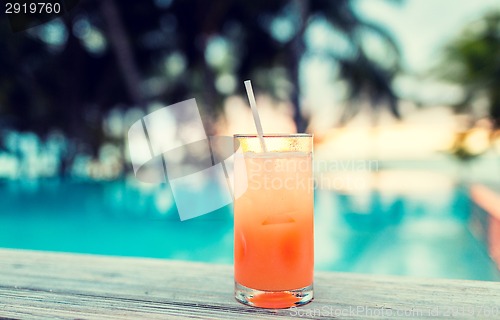 Image of cocktail drink on tropical beach