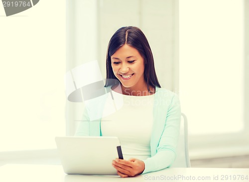 Image of businesswoman or student with tablet pc
