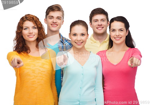 Image of group of smiling teenagers showing thumbs up
