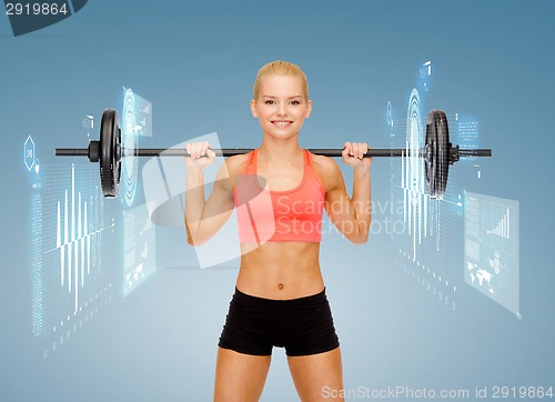 Image of smiling sporty woman exercising with barbell