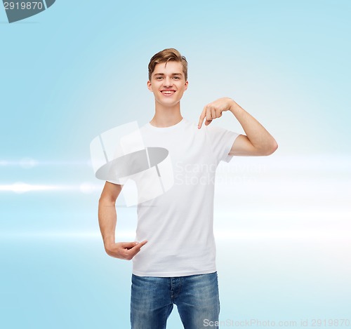 Image of smiling young man in blank white t-shirt