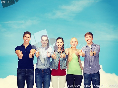 Image of group of smiling students showing thumbs up