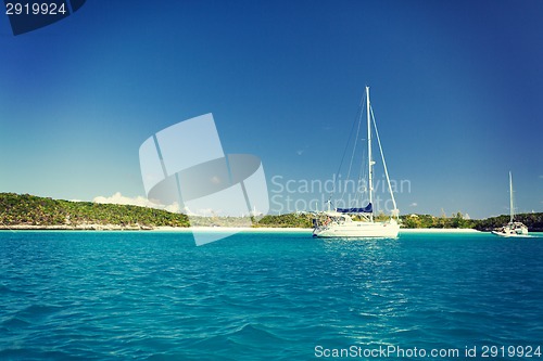 Image of white boat at blue sea