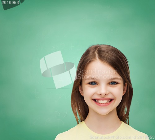 Image of smiling little girl over white background