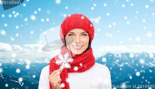 Image of smiling young woman in winter clothes