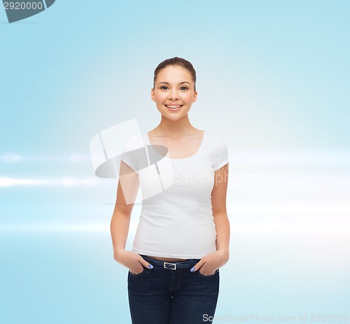 Image of smiling young woman in blank white t-shirt