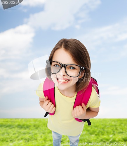 Image of happy smiling teenage girl in eyeglasses with bag