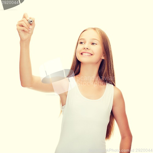 Image of girl in blank white shirt drawing something