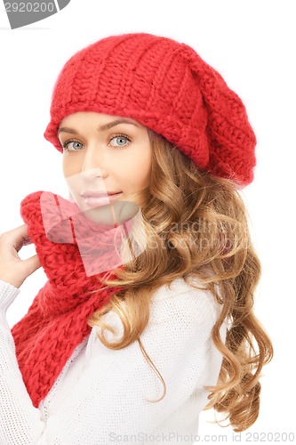 Image of smiling young woman in winter clothes