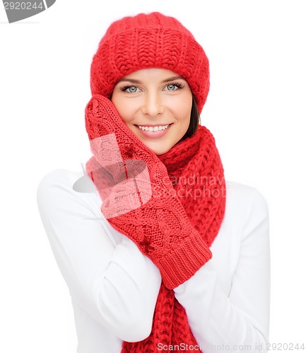 Image of smiling young woman in winter clothes