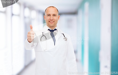Image of smiling doctor with stethoscope showing thumbs up