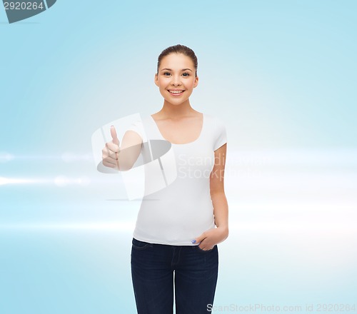 Image of smiling young woman in blank white t-shirt