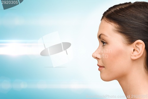 Image of profile portrait of young woman