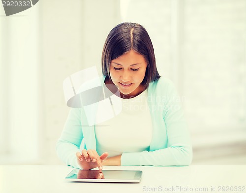 Image of smiling student girl with tablet pc