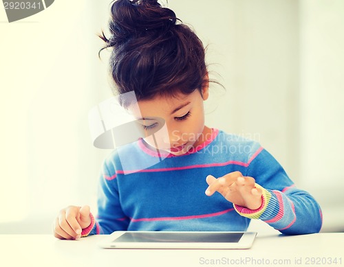 Image of girl with tablet pc at home