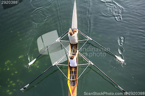 Image of Two boys in a boat