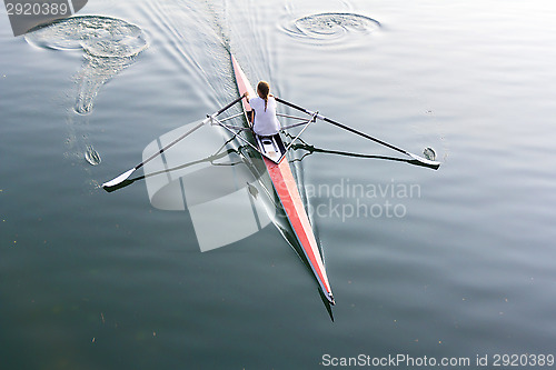 Image of Woman in a boat