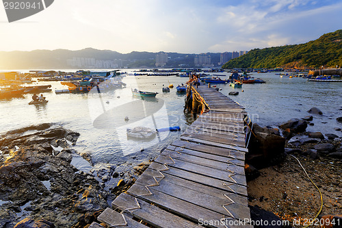 Image of Boat pier at sunset