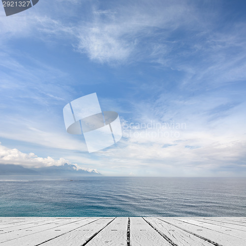 Image of sea and desk table