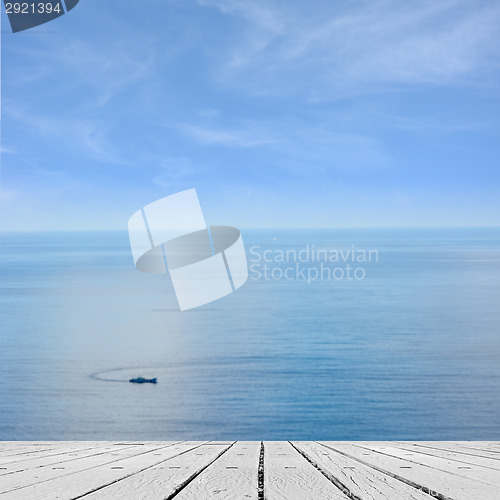 Image of sea and desk table