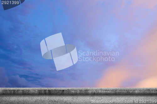 Image of concrete ground with cloudy sky