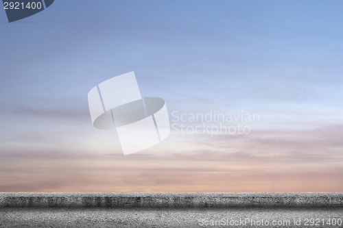 Image of concrete ground with cloudy sky