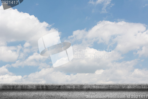 Image of concrete ground with cloudy sky