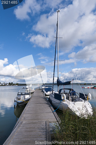 Image of Summer landscape with pier and boats