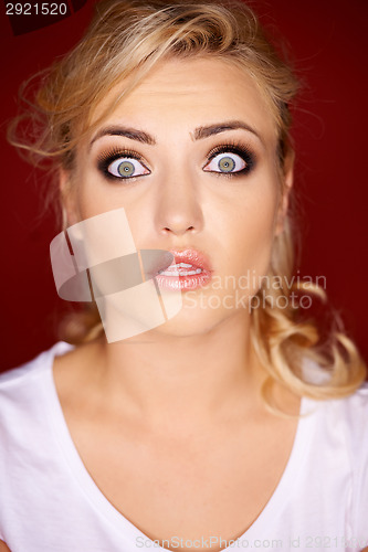 Image of Beautiful woman with a horrified expression