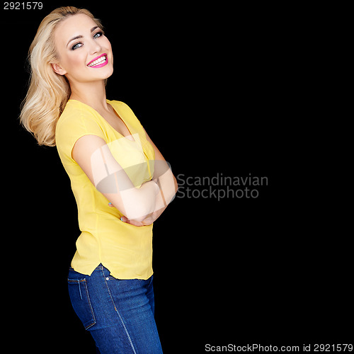 Image of Beautiful blond with folded arms