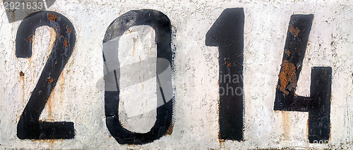 Image of Rusty metal plate with number 2014