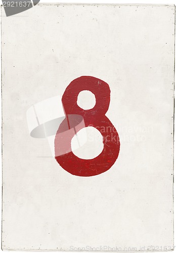 Image of number eight on white plywood board 