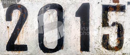Image of Rusty metal plate with numbers 