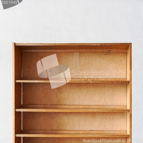 Image of empty old retro wooden book shelf