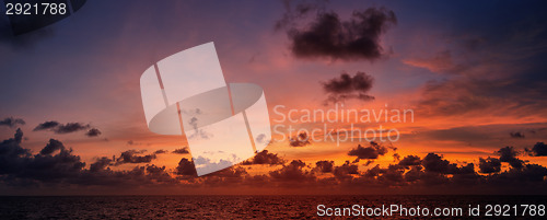 Image of Picturesque beautiful view of sky at sunset over tropical ocean