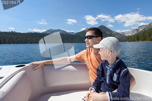 Image of family boating