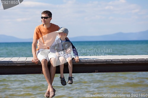 Image of family at lake vacation