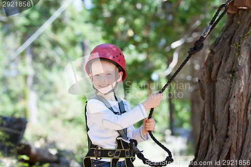 Image of kid in adventure park